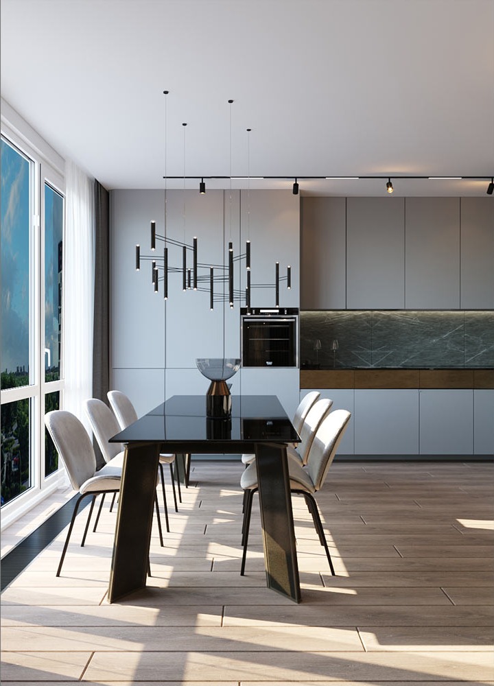 Dining table with white chairs beside floor-to-ceiling windows, kitchen beyond