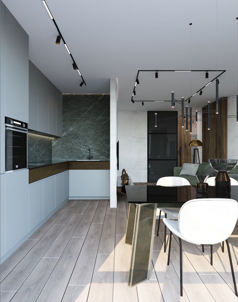 Open-plan kitchen in muted grey and green marble with a black dining table
